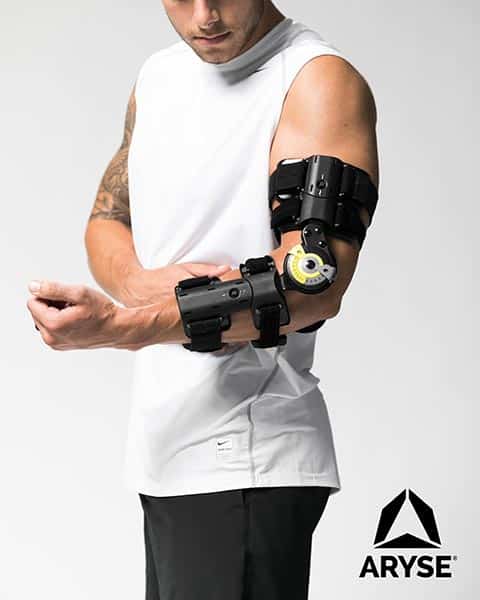 A man with an arm brace on his arm.